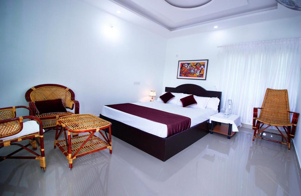 มันโร ไอส์แลนด์ เลค รีสอร์ต Hotel Mundrothuruth ภายนอก รูปภาพ